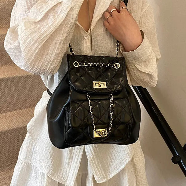 Vintage véritable sac seau en cuir noir à cordon de Vintage véritable sac seau en cuir noir à cordon de