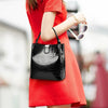 sac noir verni