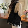 sac noir daim